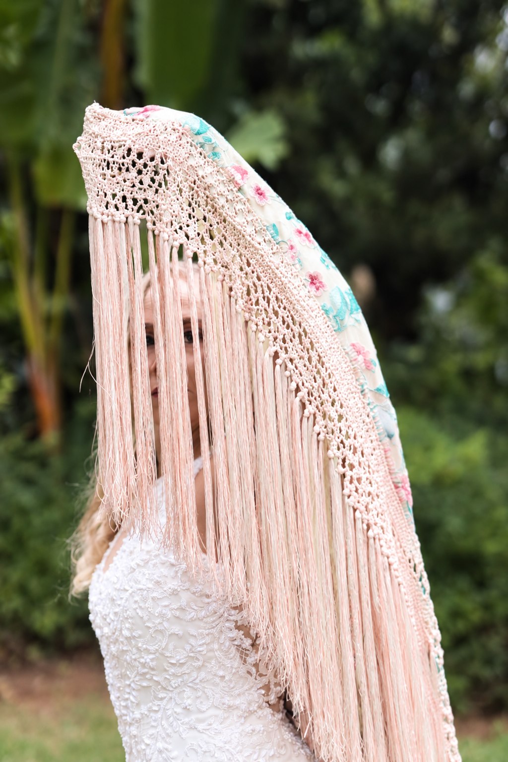 Pale pink fringed wedding shawl